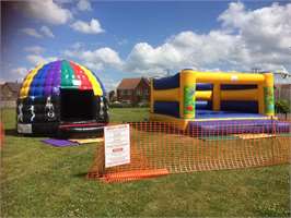 Photo of inflatable disco dome and bouncy castle at Bourne Abbey Primary School