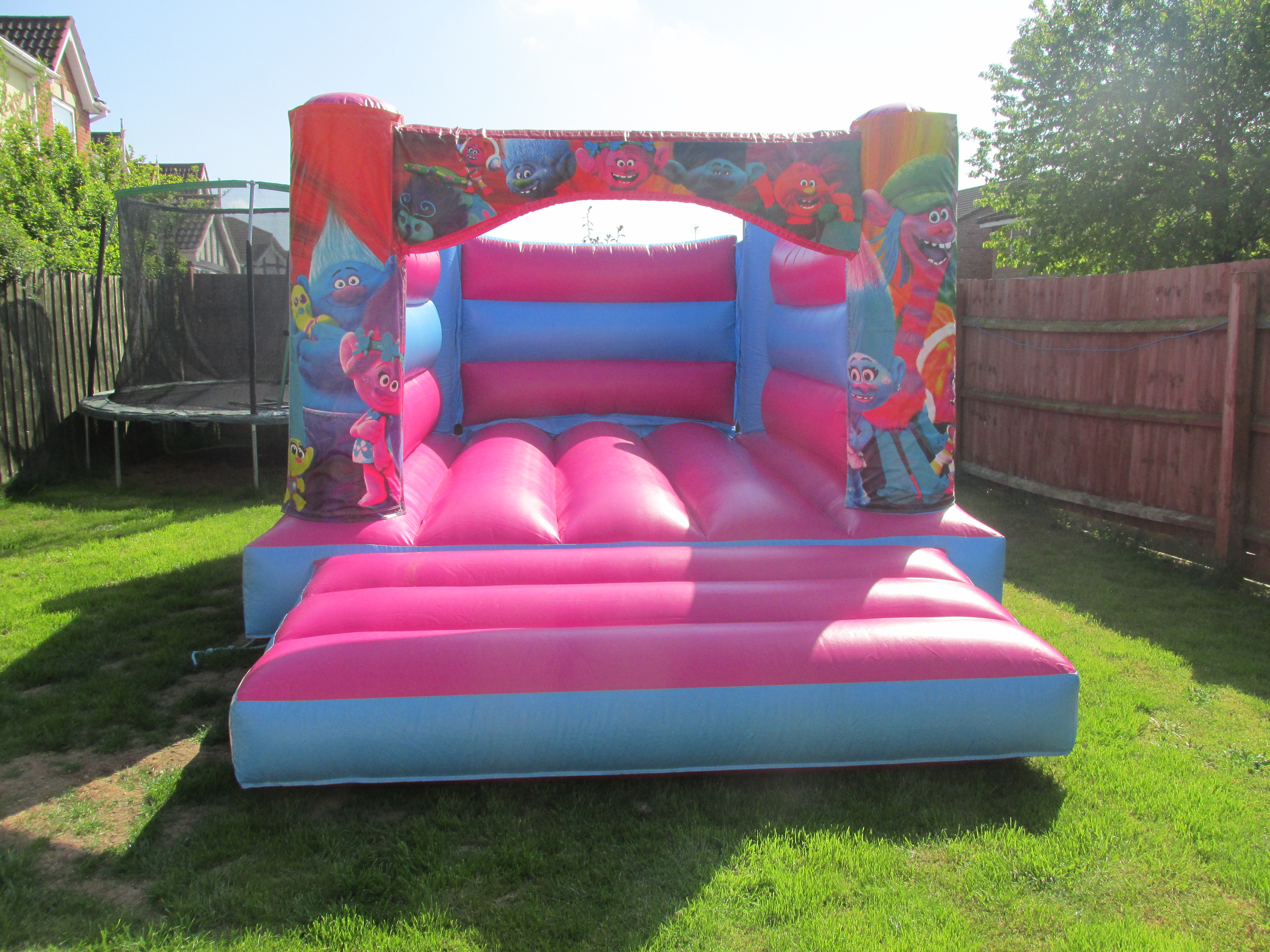Pretty Pink Trolls Bouncy Castle Hire In Peterborough, Bourne, Spalding and Grantham.
