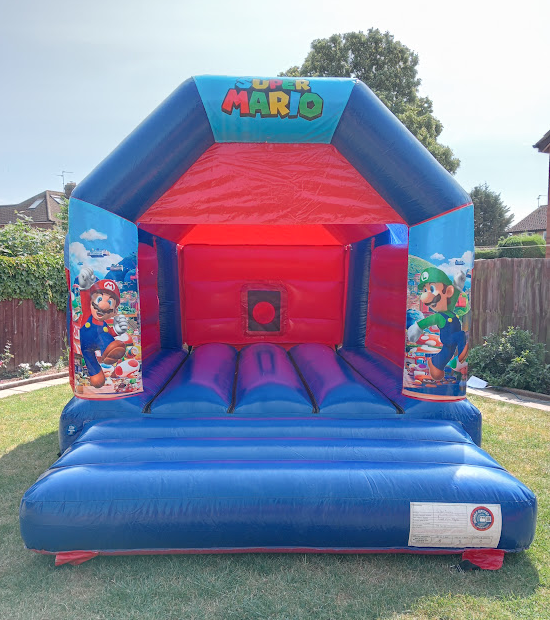 Stunning red and blue Super Mario Bouncy Castle Hire in Peterborough
