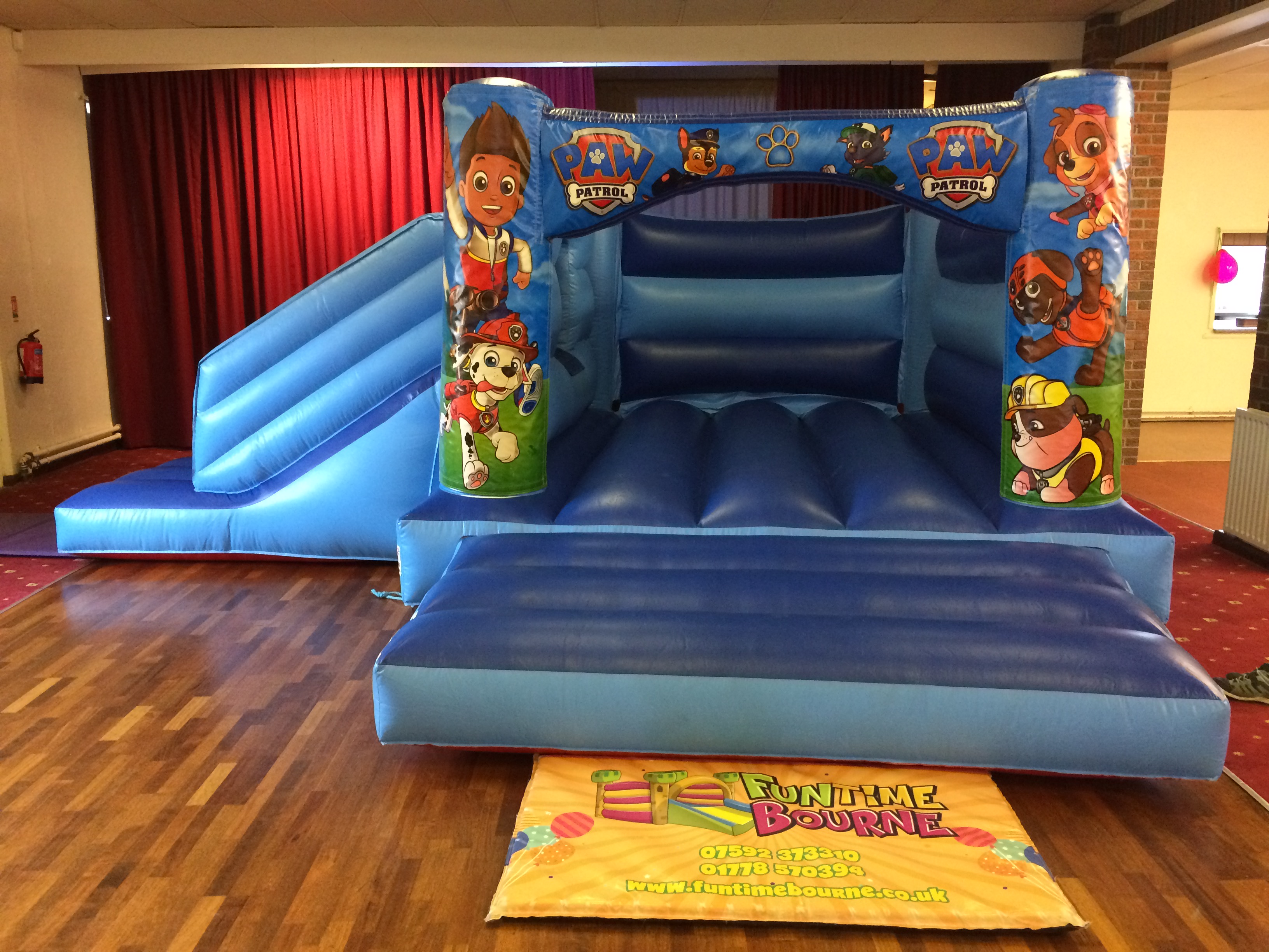 Blue bouncy castle in Billingborough Village Hall